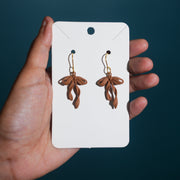Brown Twisted Bow Enamel Earrings.