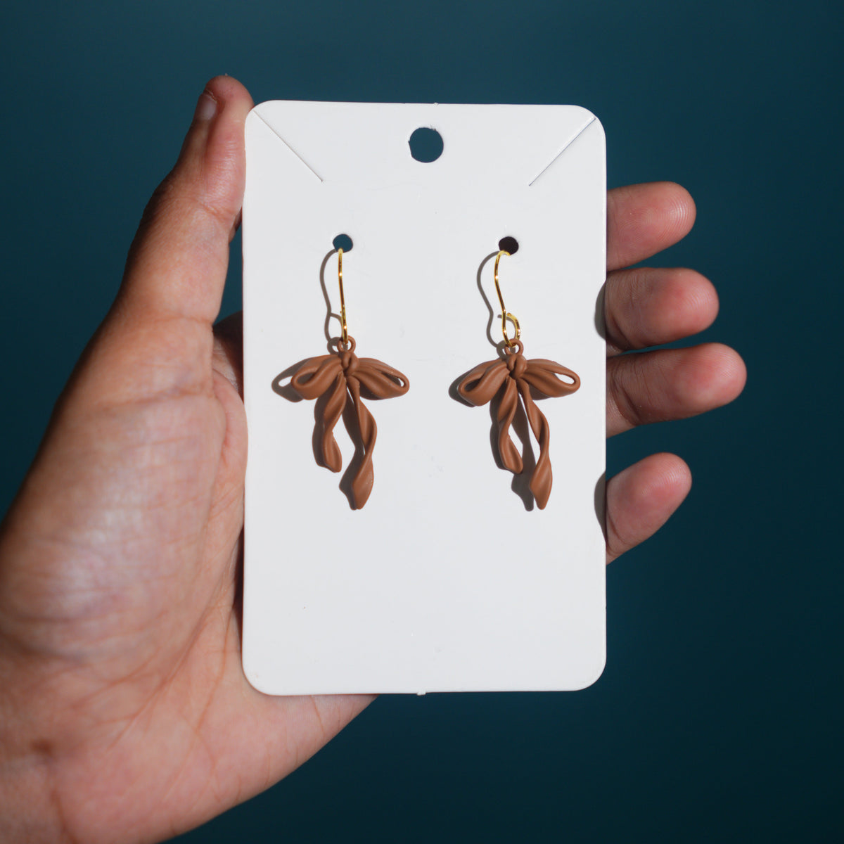 Brown Twisted Bow Enamel Earrings.