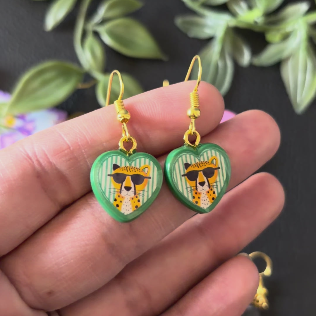 Load video: Tiny Wild Heart Leopard Drops.