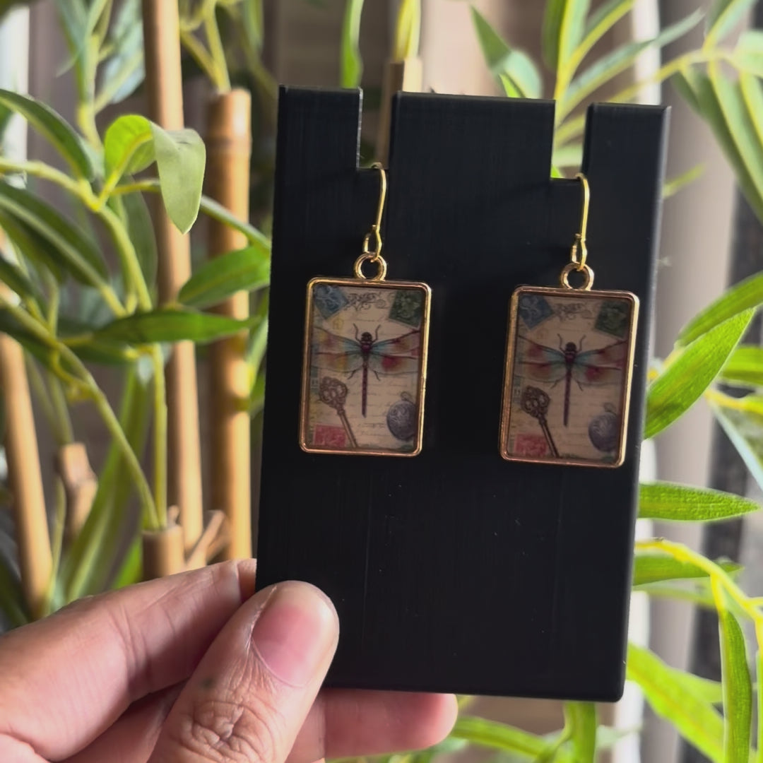 Load video: Antique Letter Dragonfly Drops